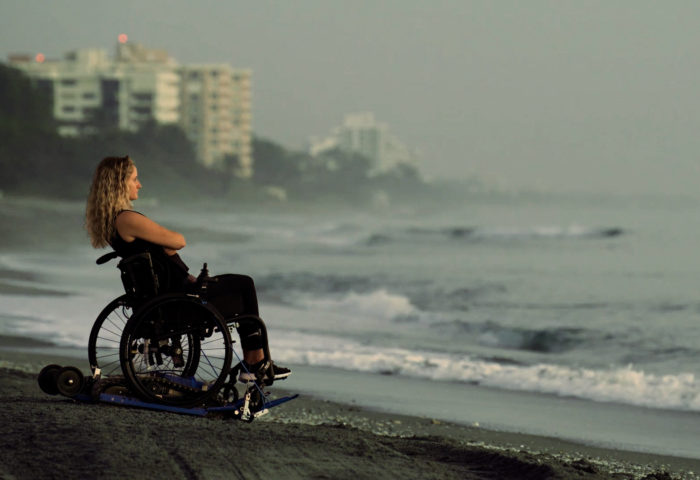 A photo of Brooke, a young woman from South Florida and ambassador for Redbull Wings For Life, who suffered a spinal cord injury in her senior year of highschool, leaving her paralyzed from the waist down. Following her injury, Brooke pursued a degree in interior design and interior architecture from SCAD, and is now working to design accessible spaces for others with spinal cord injuries. Brooke’s story is featured in this episode of Medical Stories, Season Two.